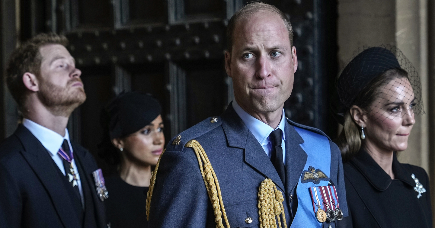 Prince Harry and Meghan look frustrated as Prince William and Kate look downcast