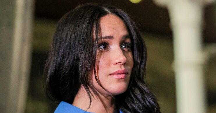 Meghan Markle in blue shirt