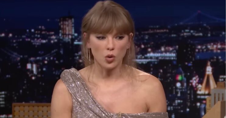 Taylor Swift looking down