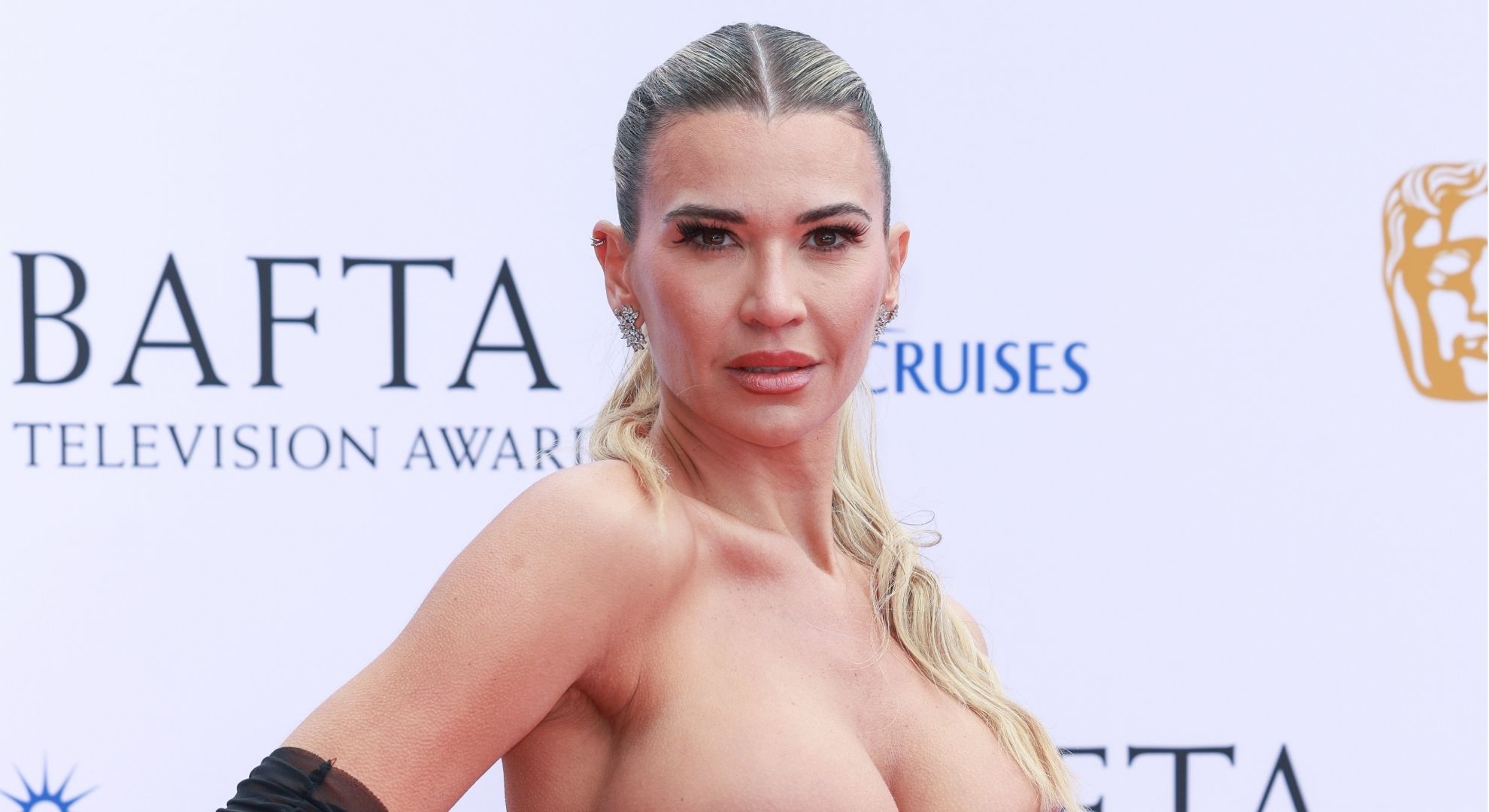 ‘Gorgeous’ Christine McGuinness slips into tiny gold bikini as fans declare her ‘the body of perfection’