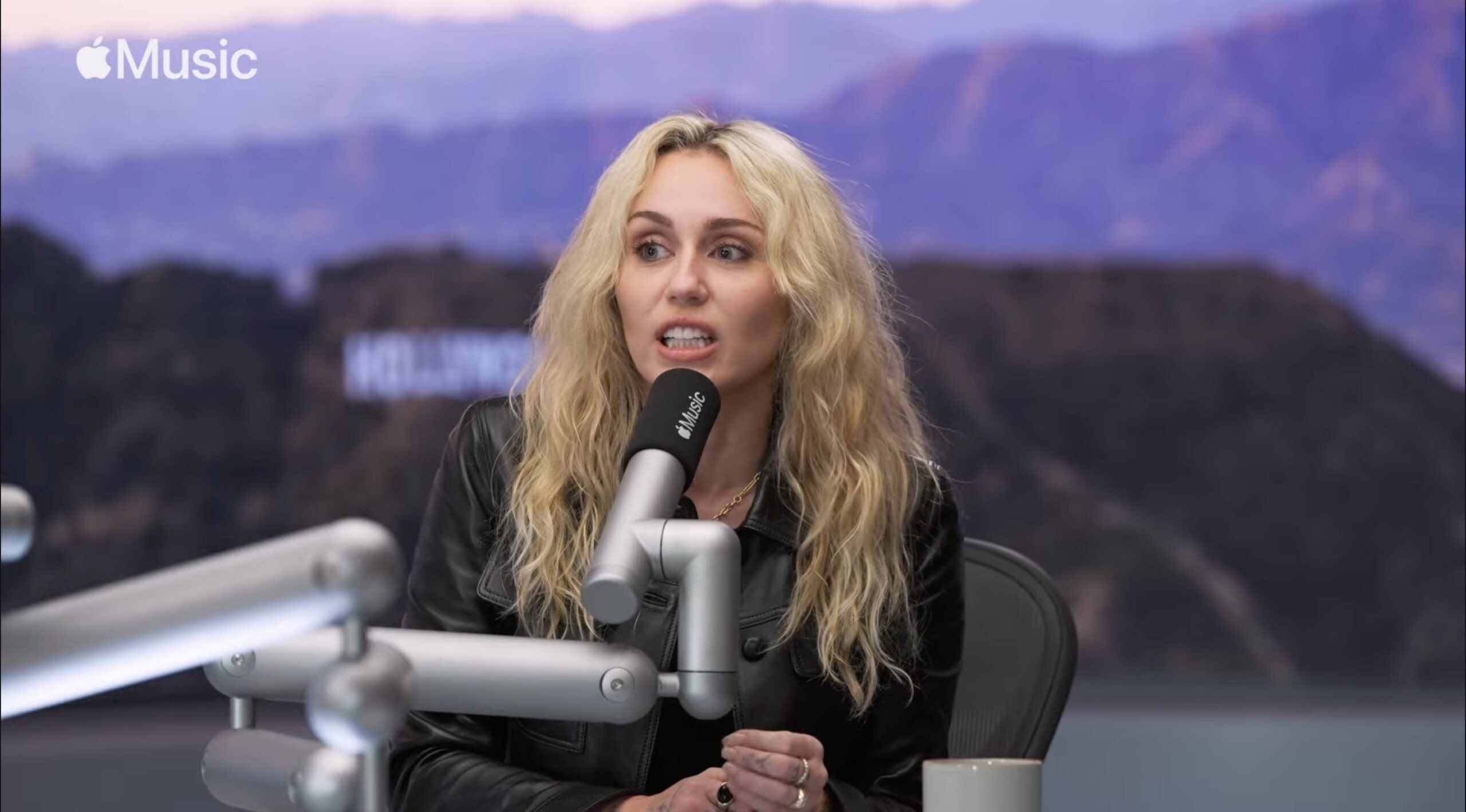 Miley Cyrus talking to Zane Lowe