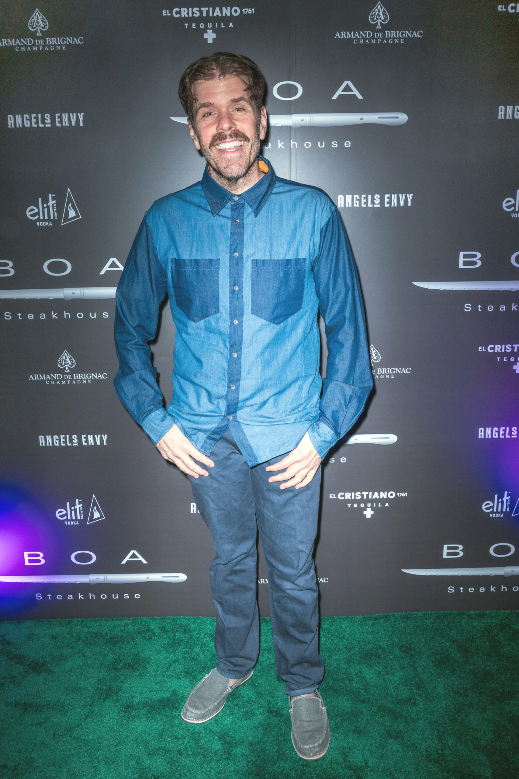 Perez Hilton wears denim shirt