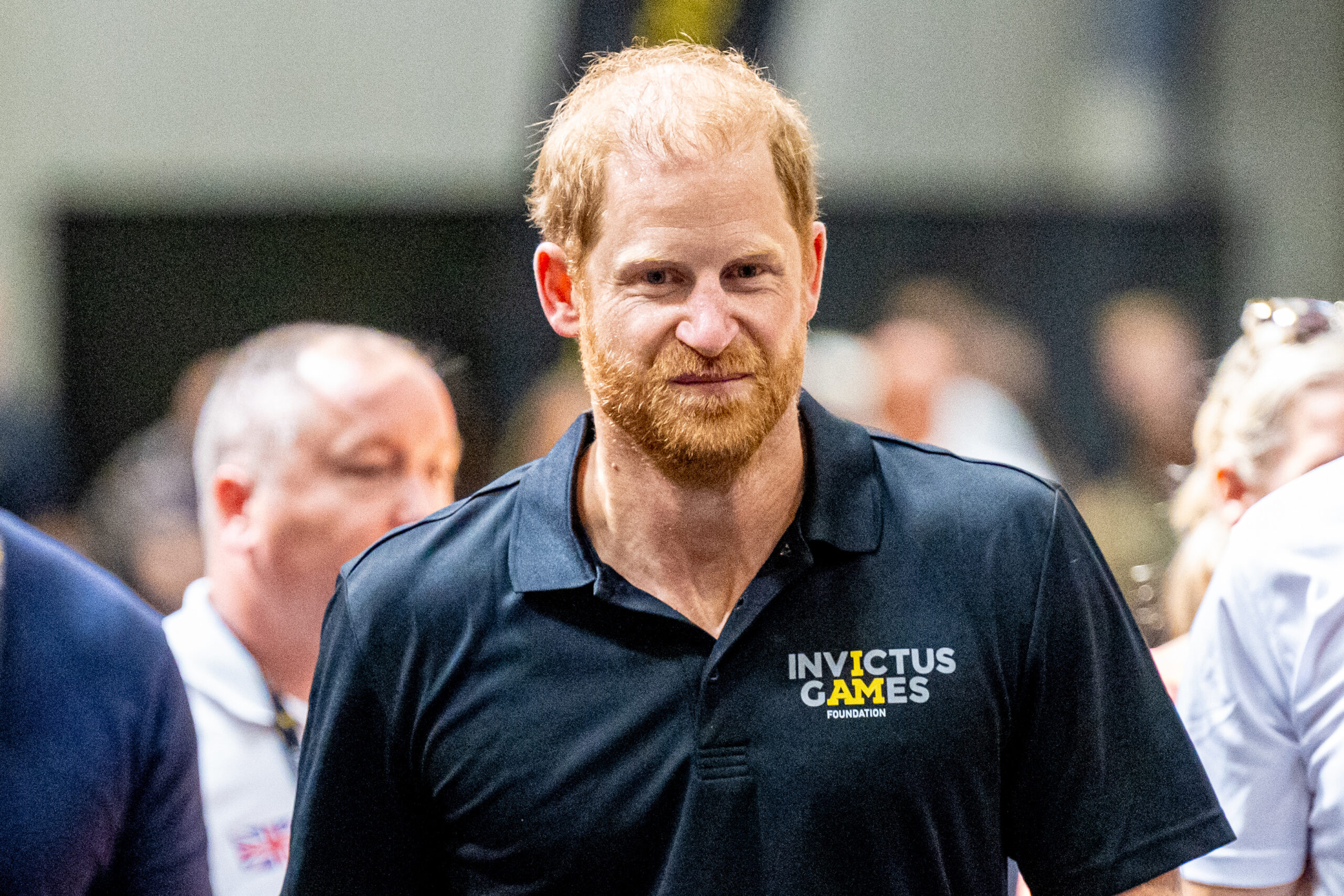 Prince Harry in a black t-shirt 