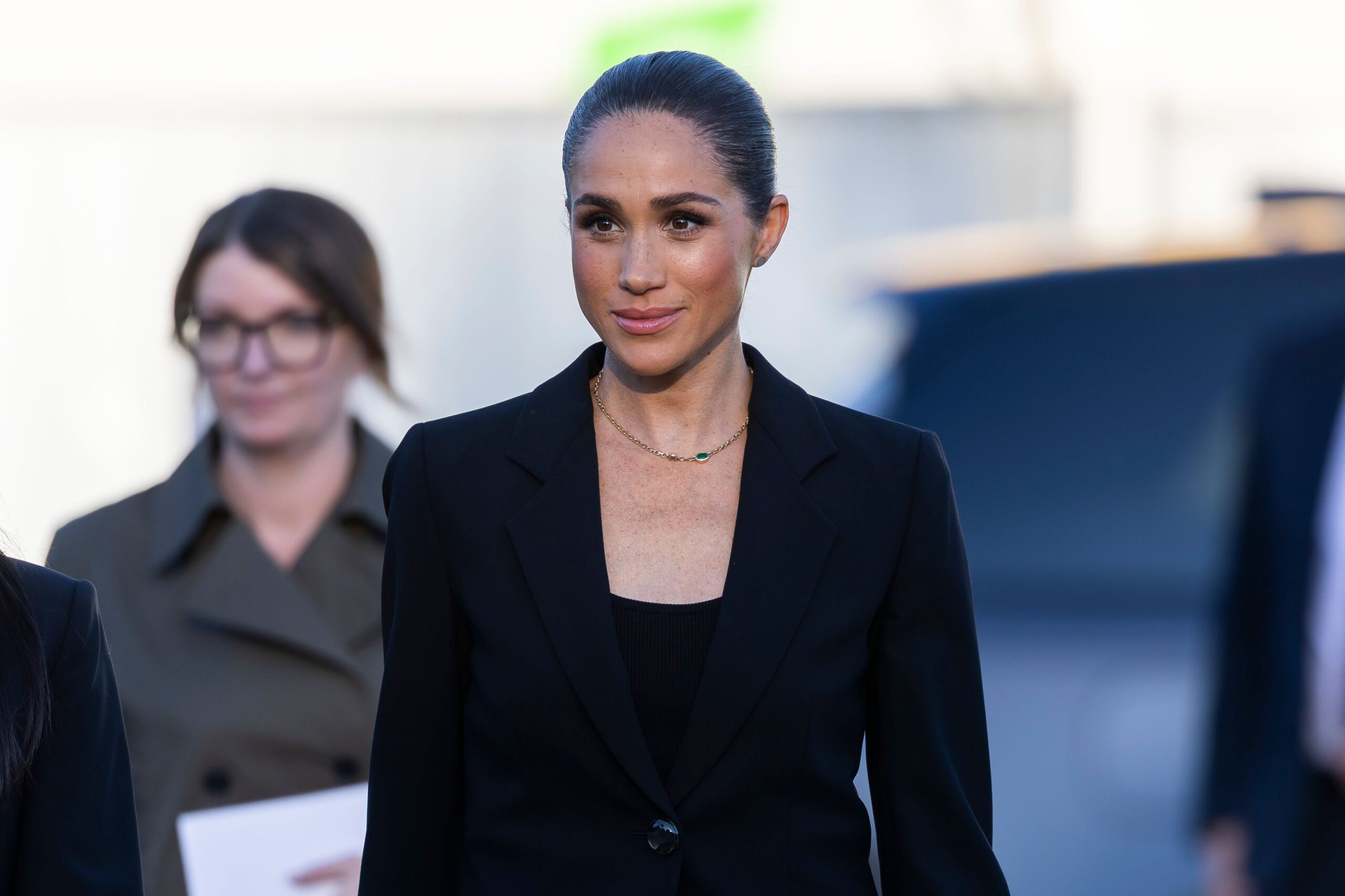 Meghan Markle in a black suit