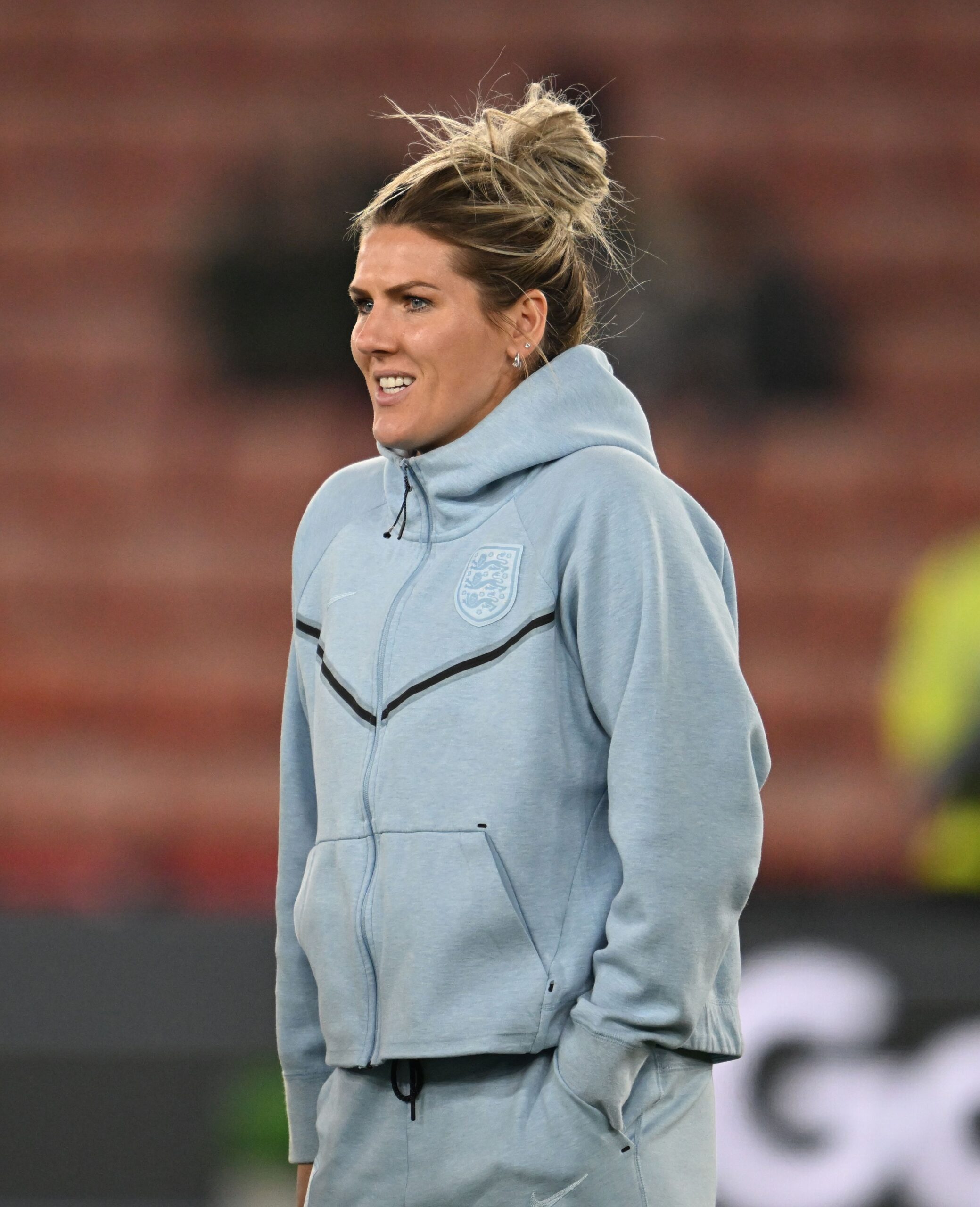 Millie Bright on football pitch