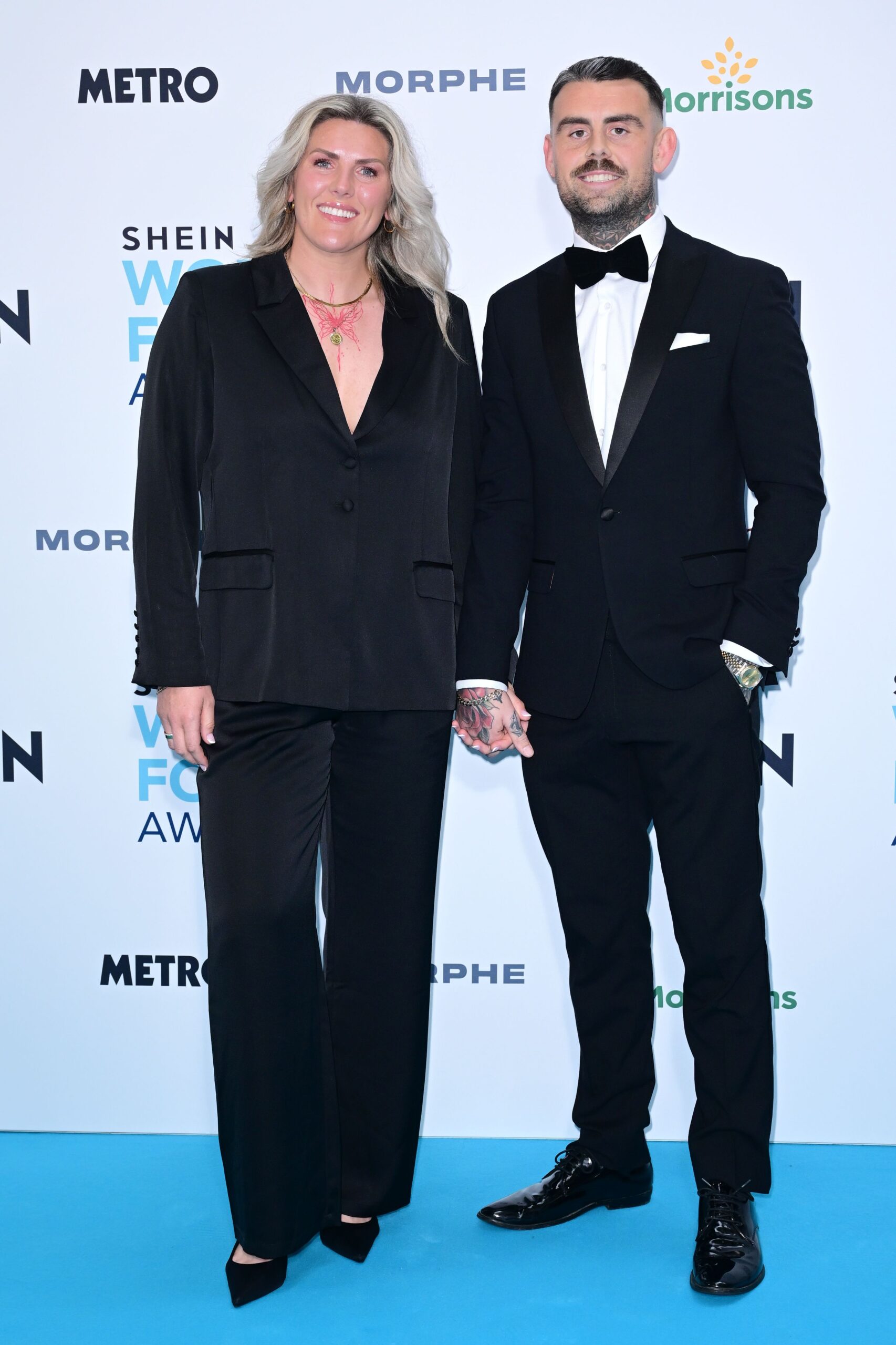 Millie Bright and boyfriend at event