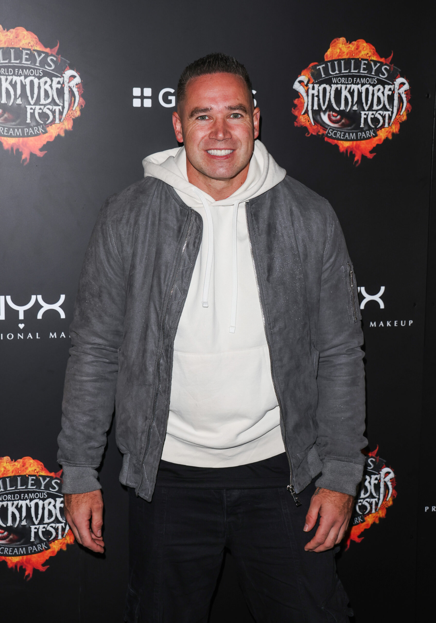Kieran Hayler smiling at event