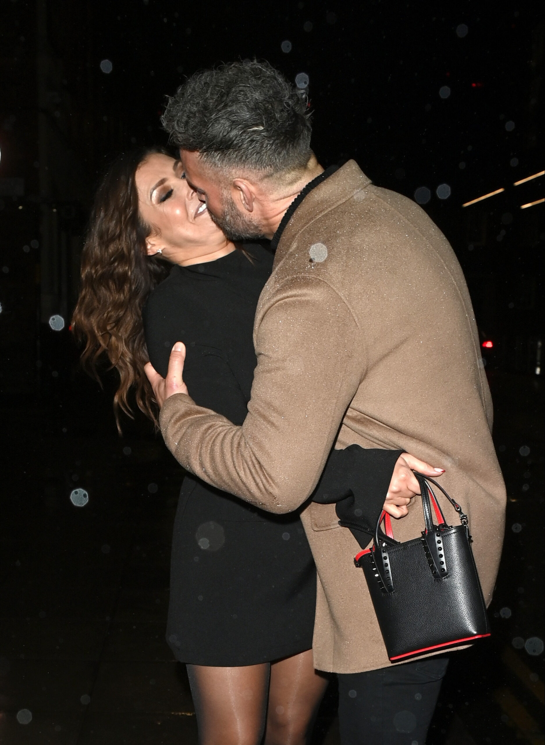 Kym Marsh and Tom Dickinson kissing