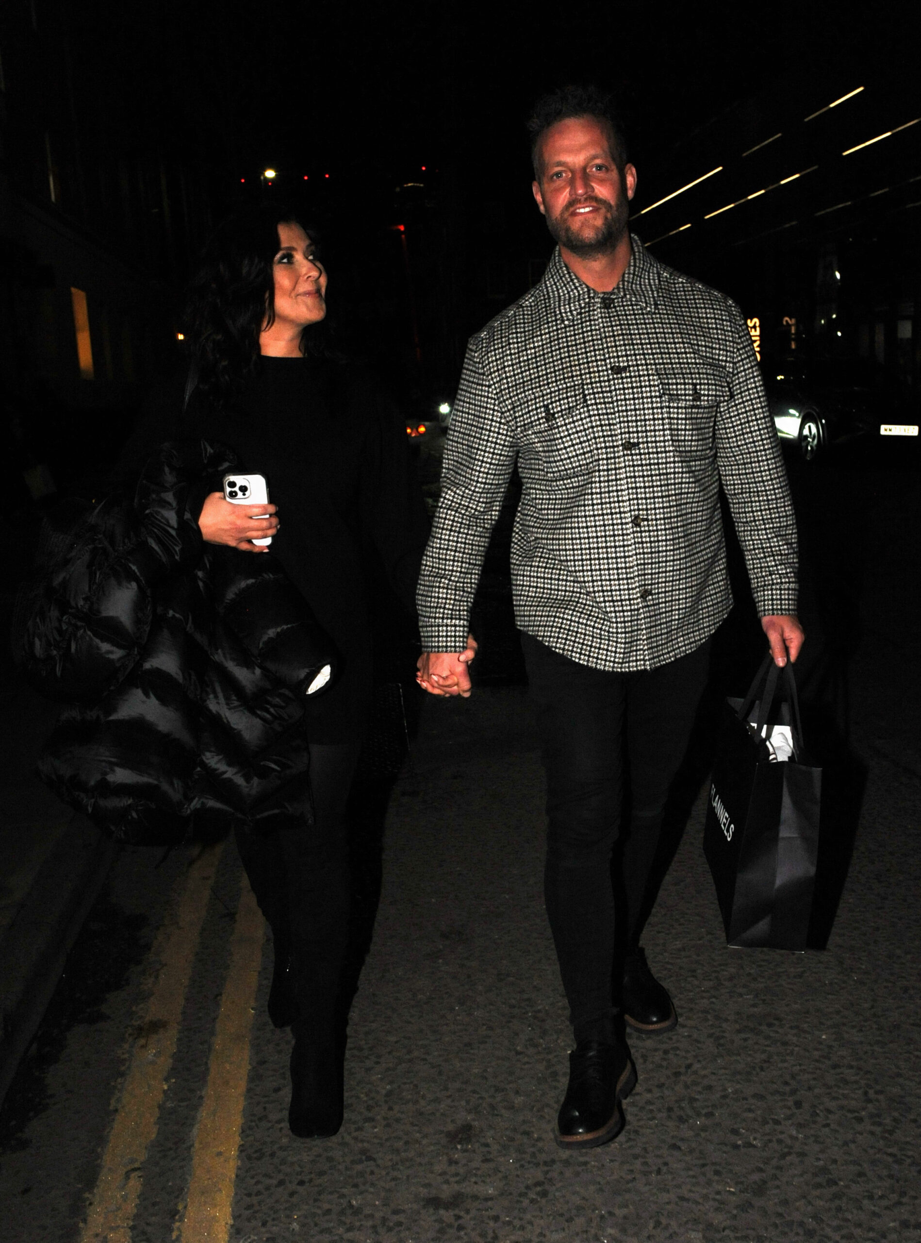 Kym Marsh and Tom Dickinson holding hands