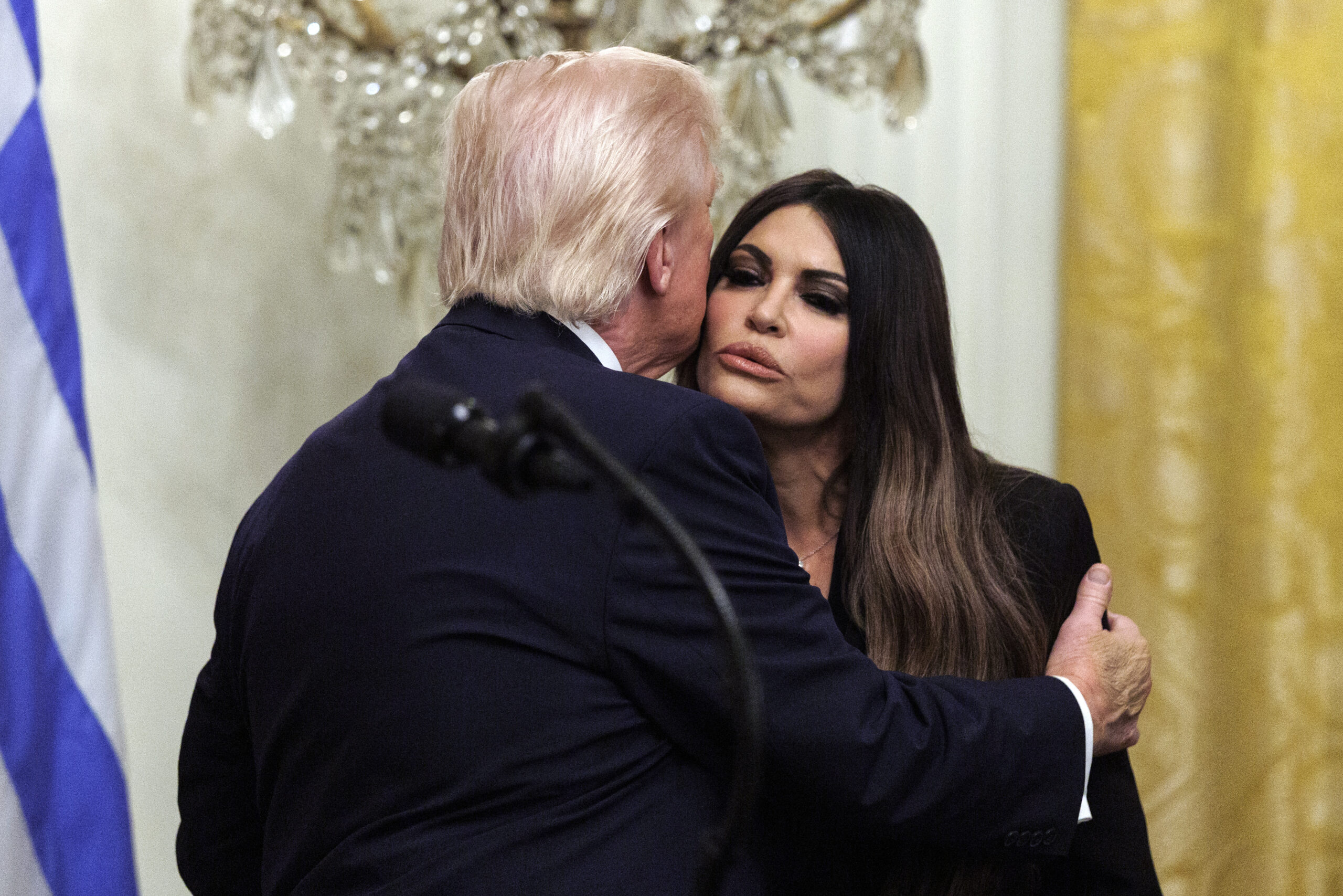 Donald Trump kisses Kimberly Guilfoyle on the cheek