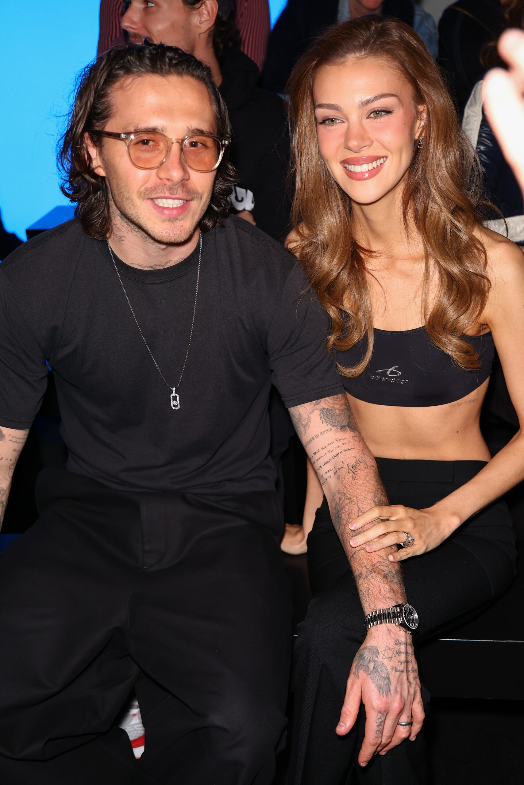Brooklyn Beckham and Nicola Peltz smiling