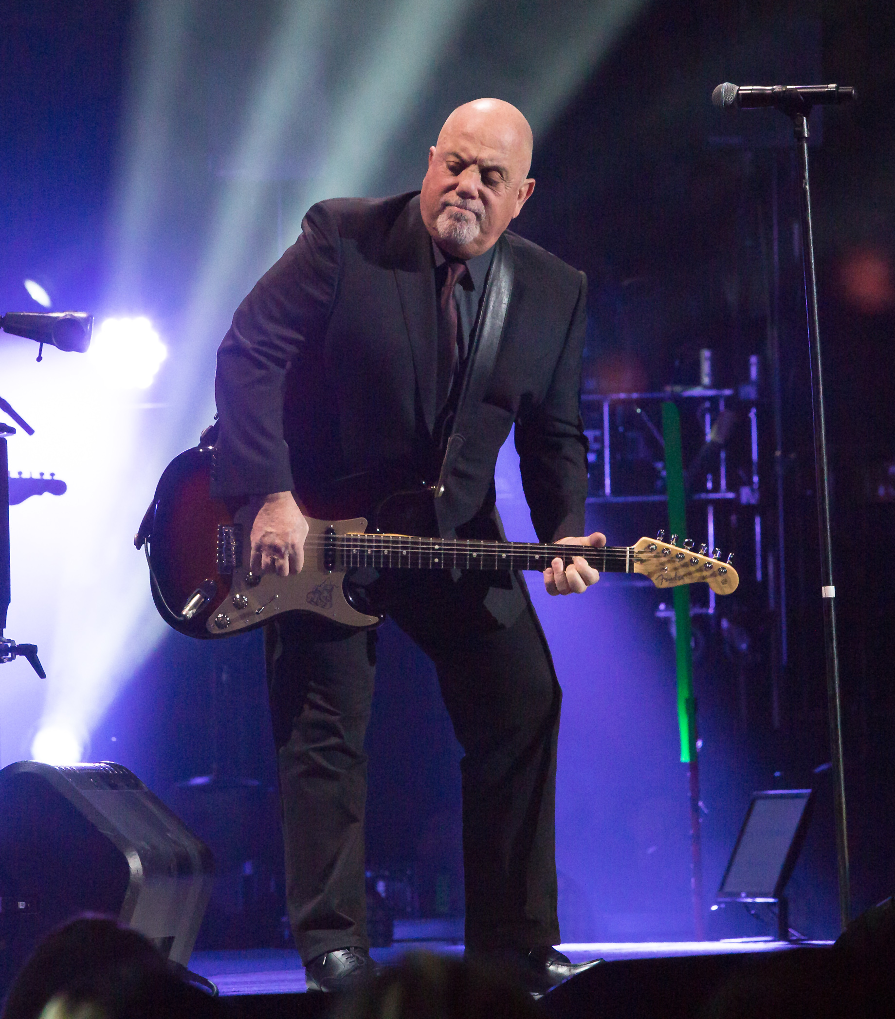 Billy Joel performs with guitar