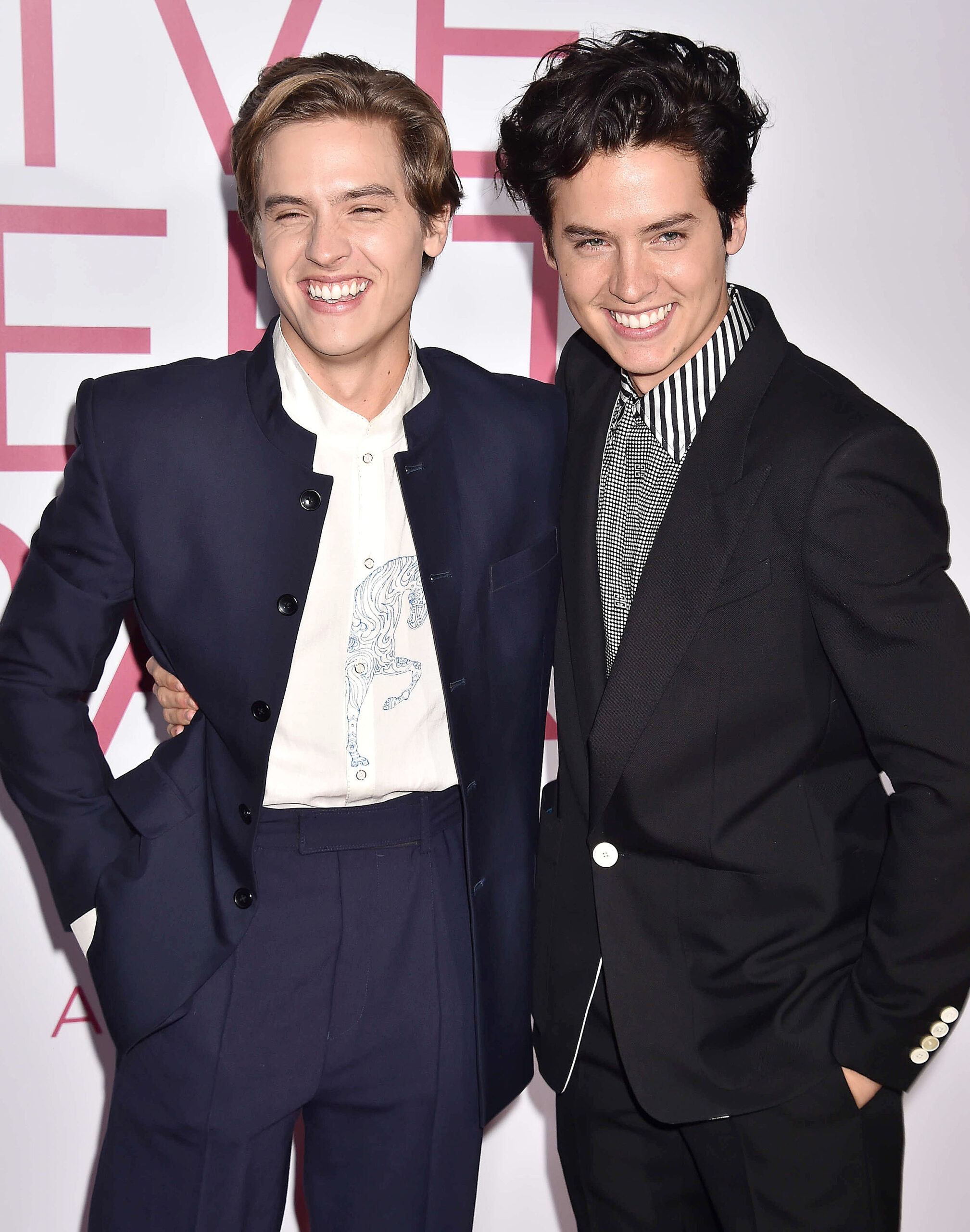 Dylan and Cole Sprouse embrace each other