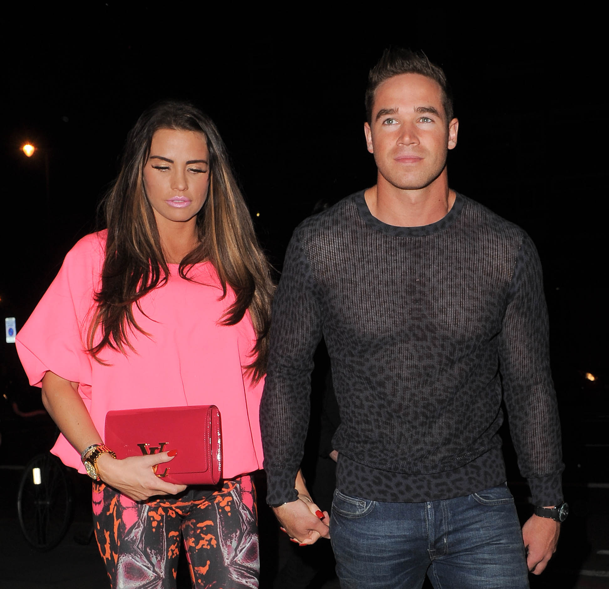 Katie Price and Kieran Hayler holding hands