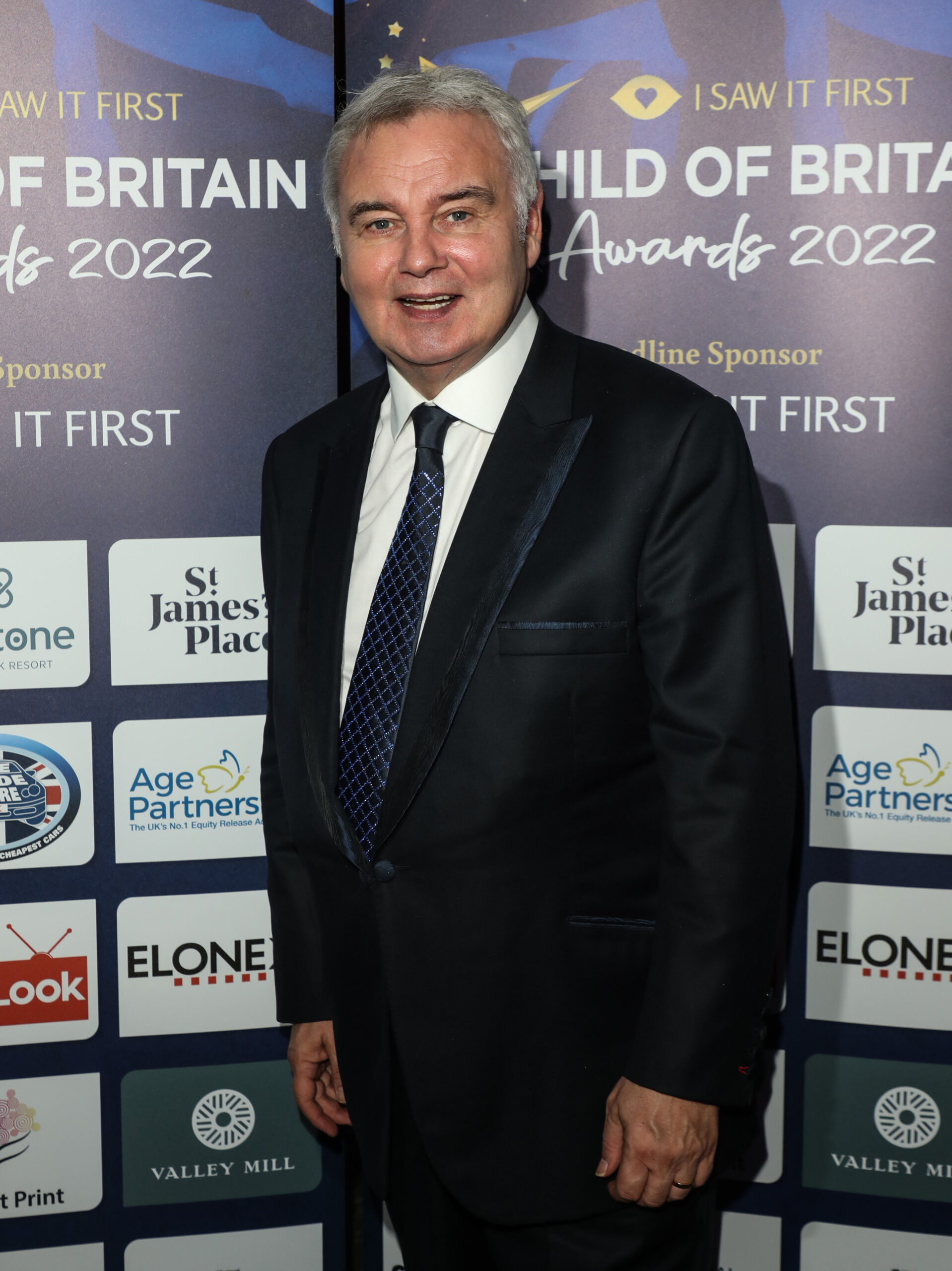 Eamonn Holmes in suit at event