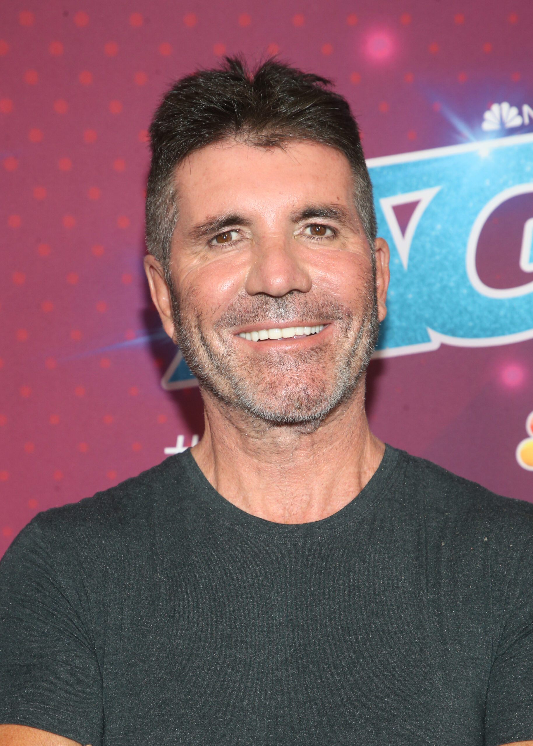 Simon Cowell smiling