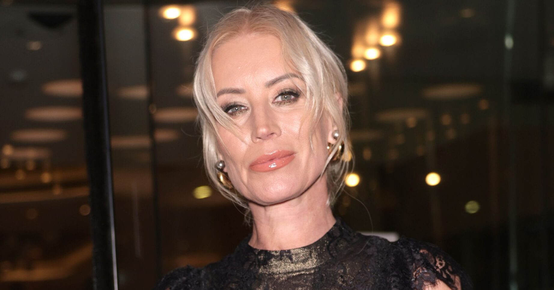 Denise Van Outen smirking