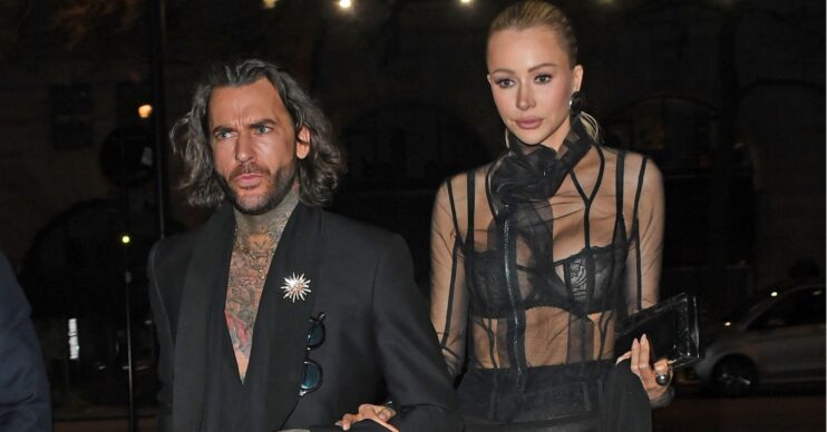 Pete Wicks and Olivia Attwood linking arms