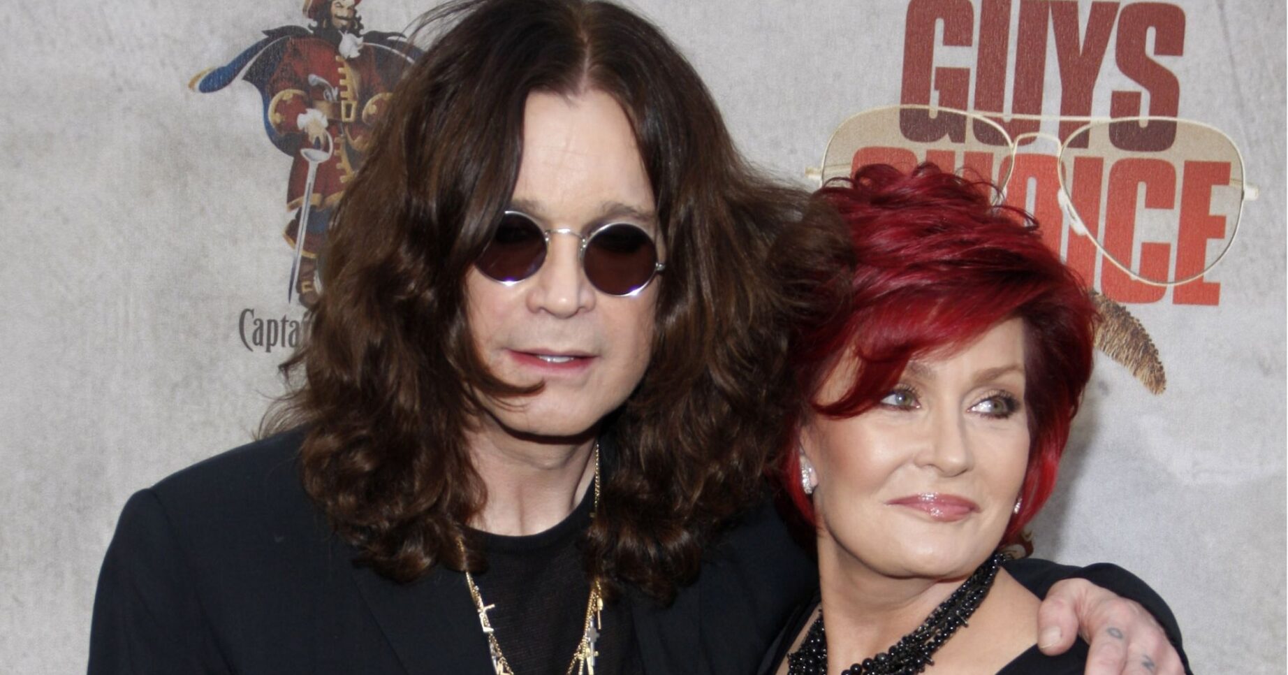 Sharon and Ozzy Osbourne smiling