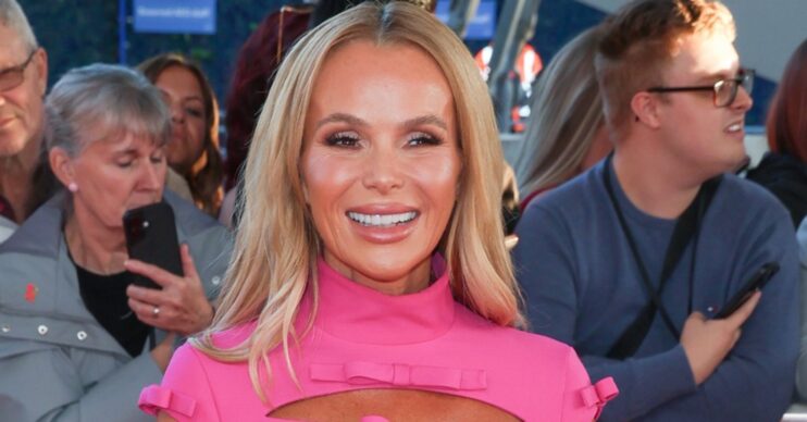 Amanda Holden smiling on the red carpet