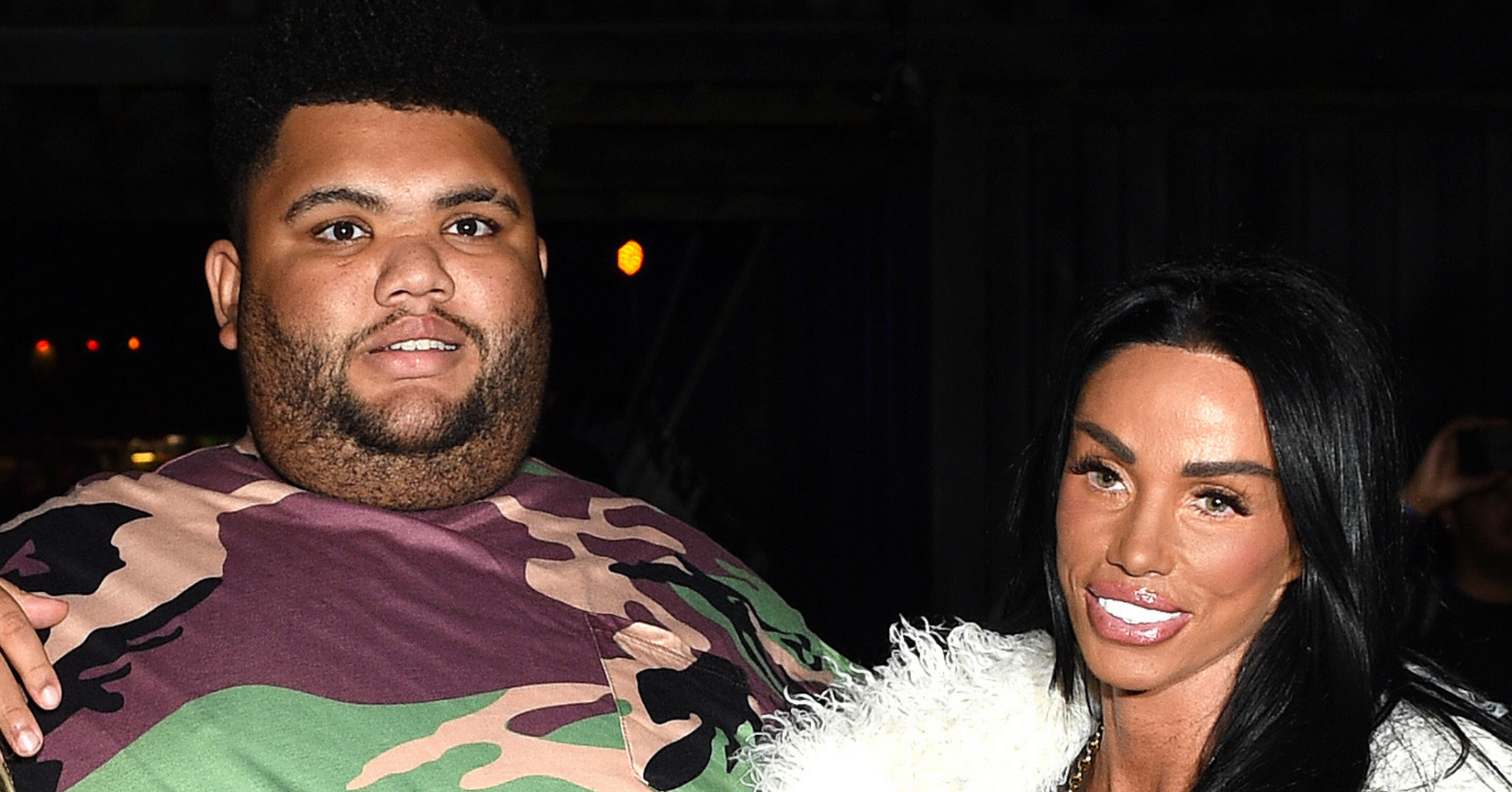 Katie Price and Harvey smiling at event