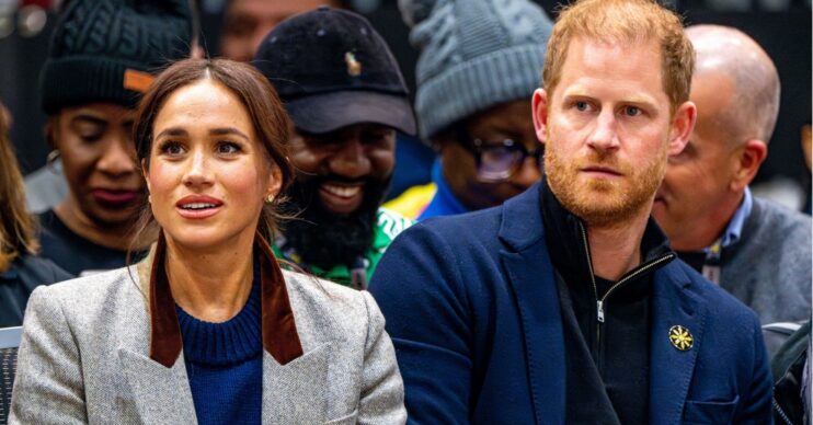 Prince Harry and Meghan looking surprised