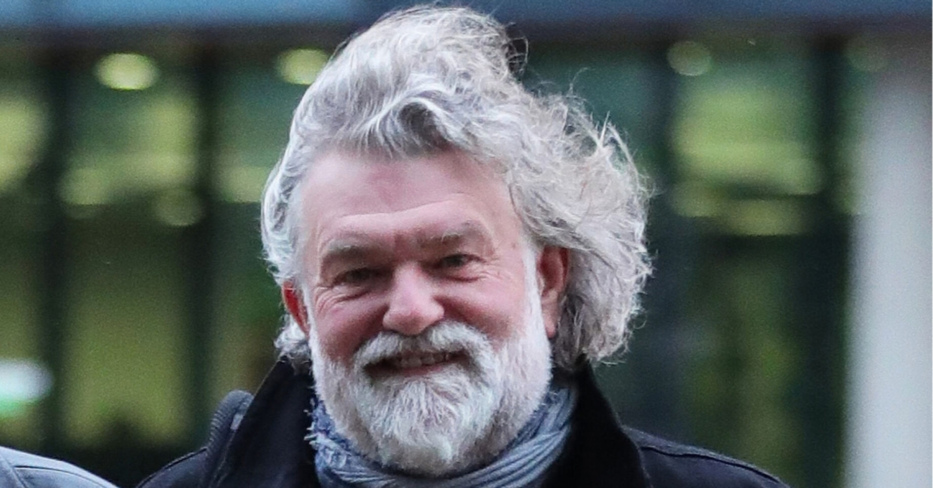 Si King smiling while out and about