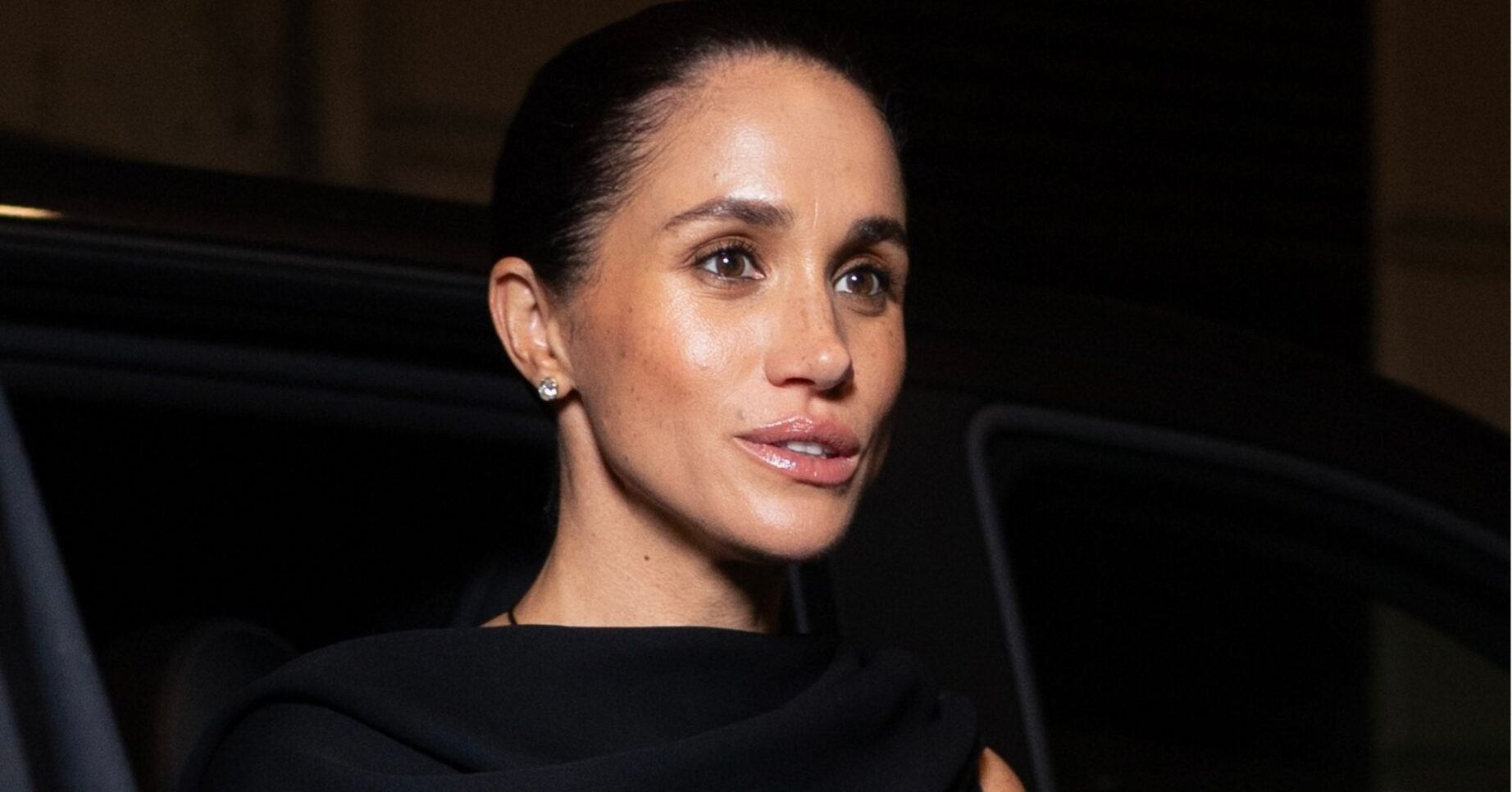 Meghan Markle in a black dress