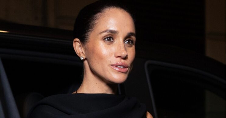 Meghan Markle in a black dress