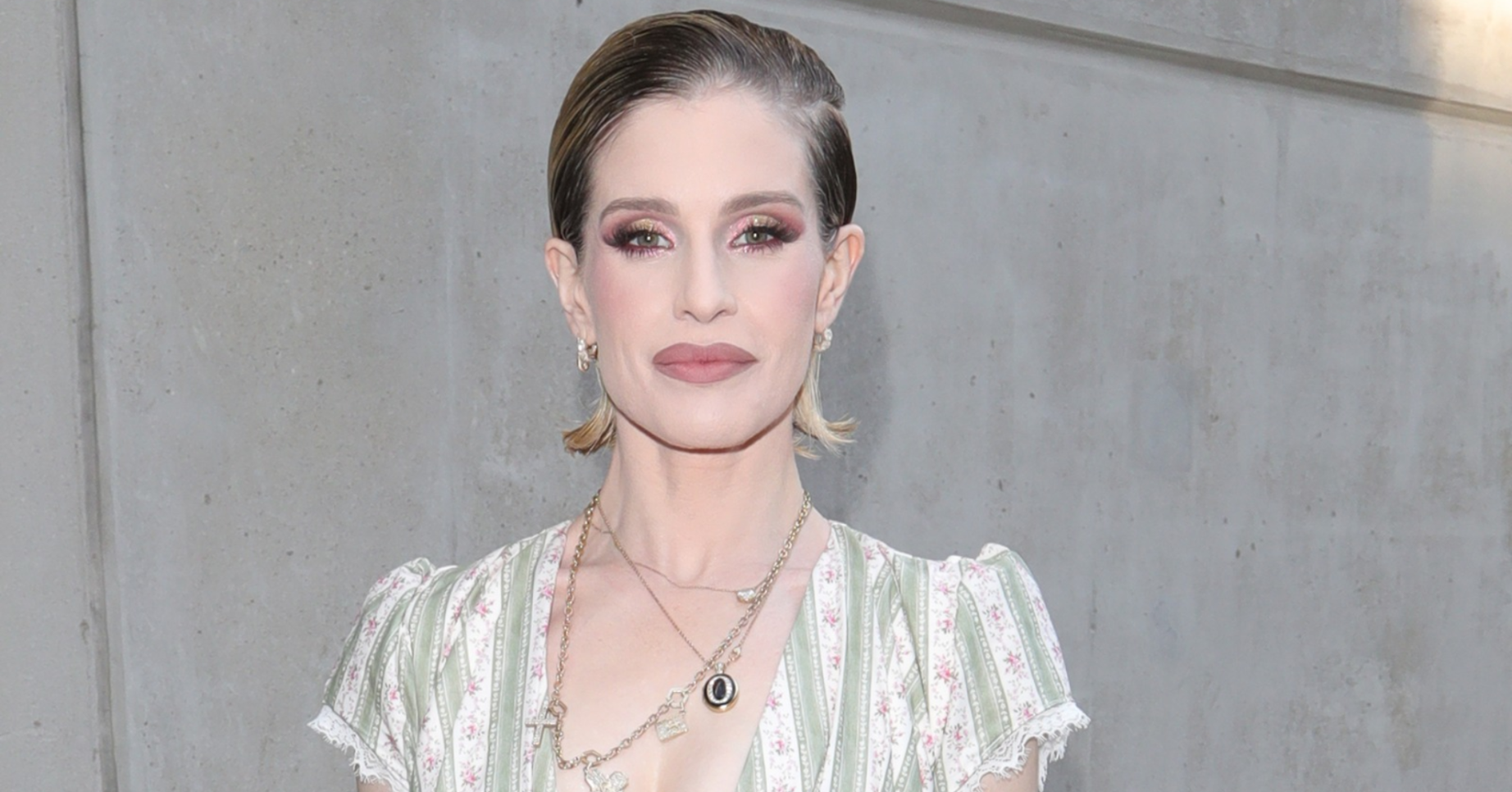 Kelly Osbourne wears a white dress
