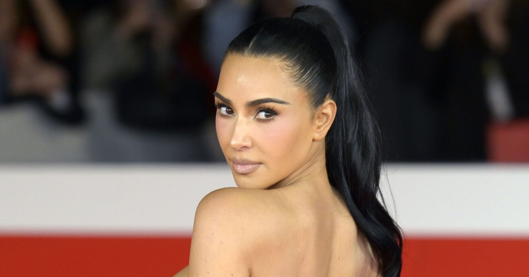 Kim Kardashian looking over her shoulder
