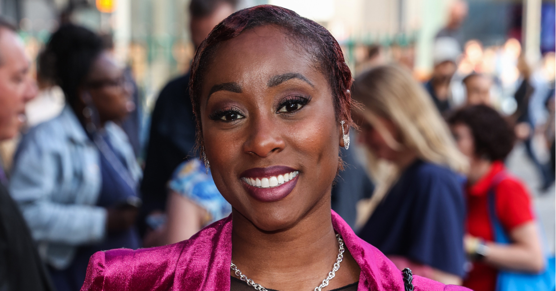 Scarlette Douglas smiling at event