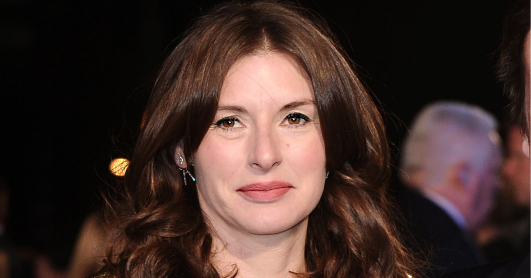 Jools Oliver smiling at event