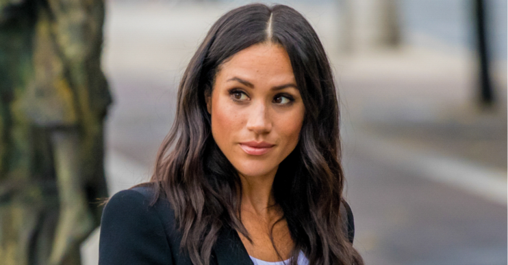 Meghan Markle looks into the distance