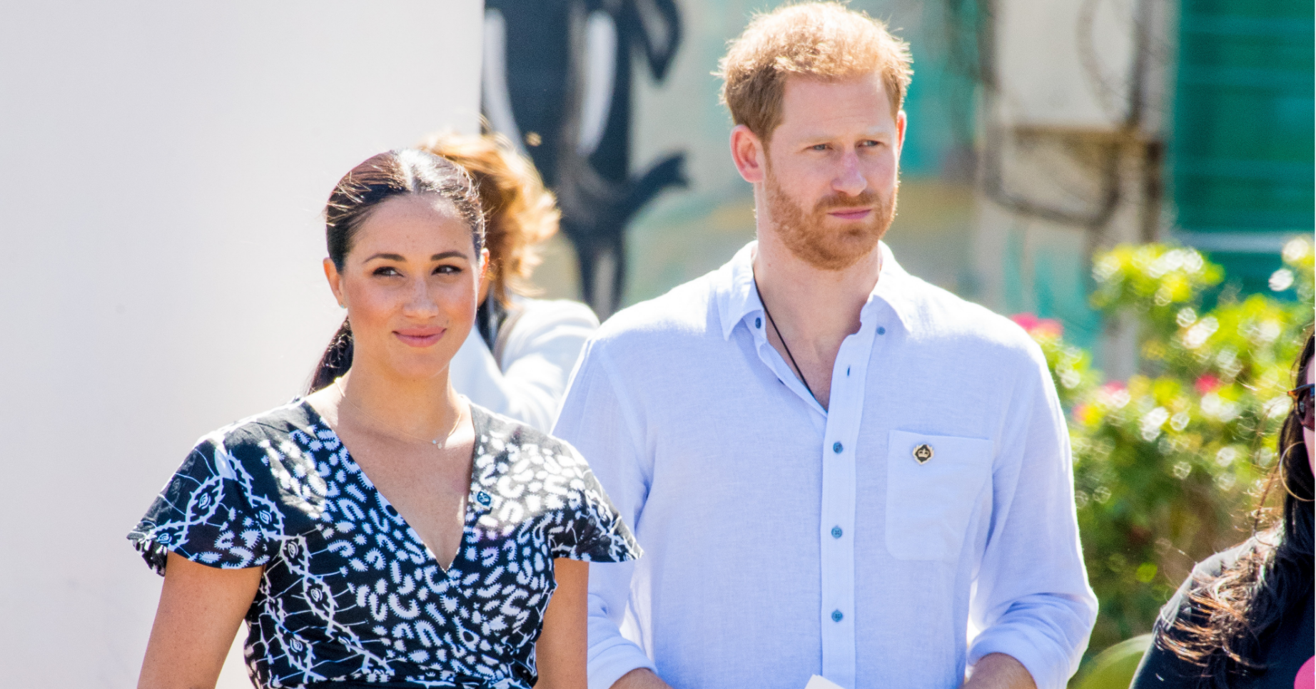 Meghan and Prince Harry walk alongside each other