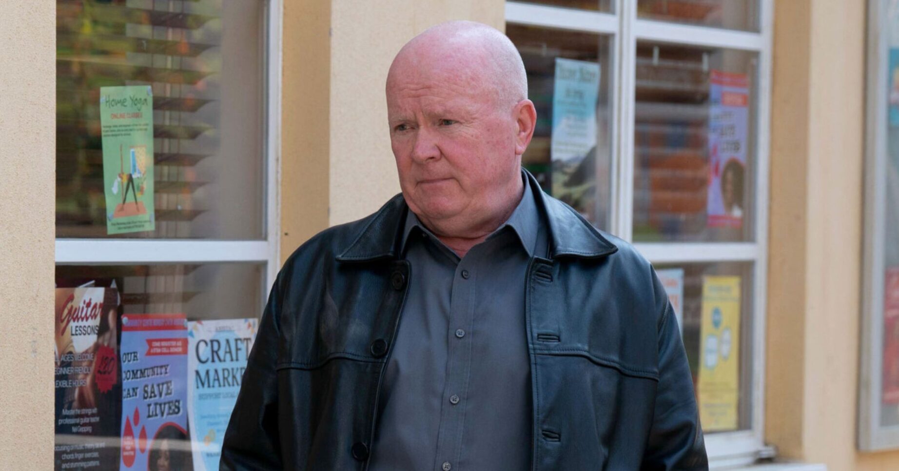 Phil Mitchell on EastEnders standing outside