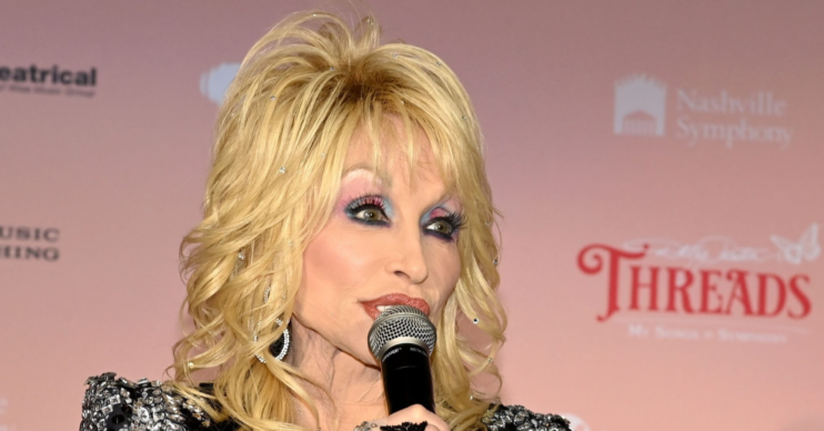 Dolly Parton on a microphone