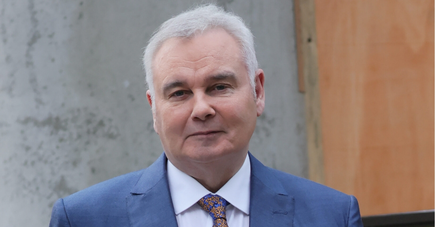 Eamonn Holmes in blue suit