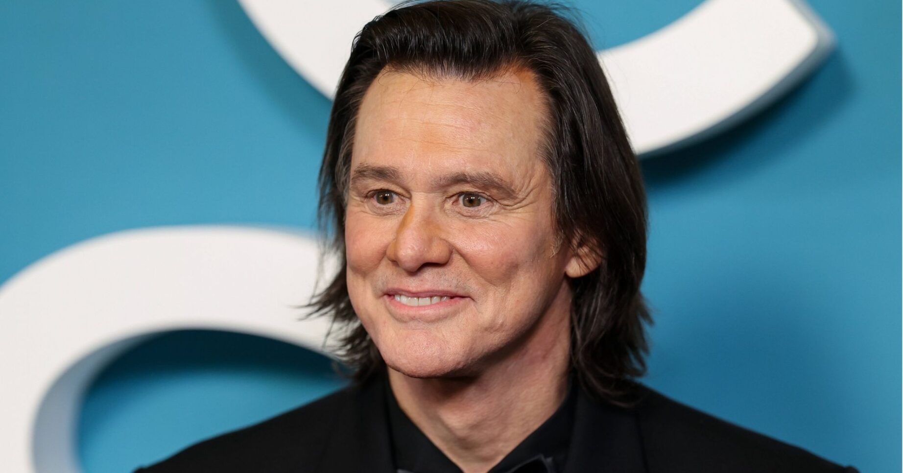 Jim Carrey smiling on the red carpet