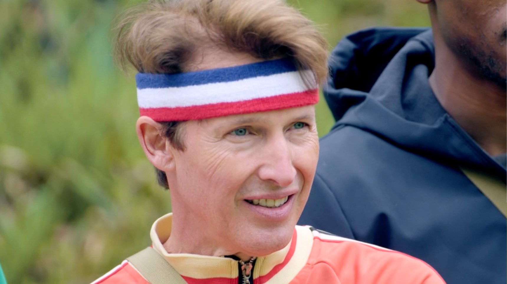 James Blunt in red, white and blue sweatband