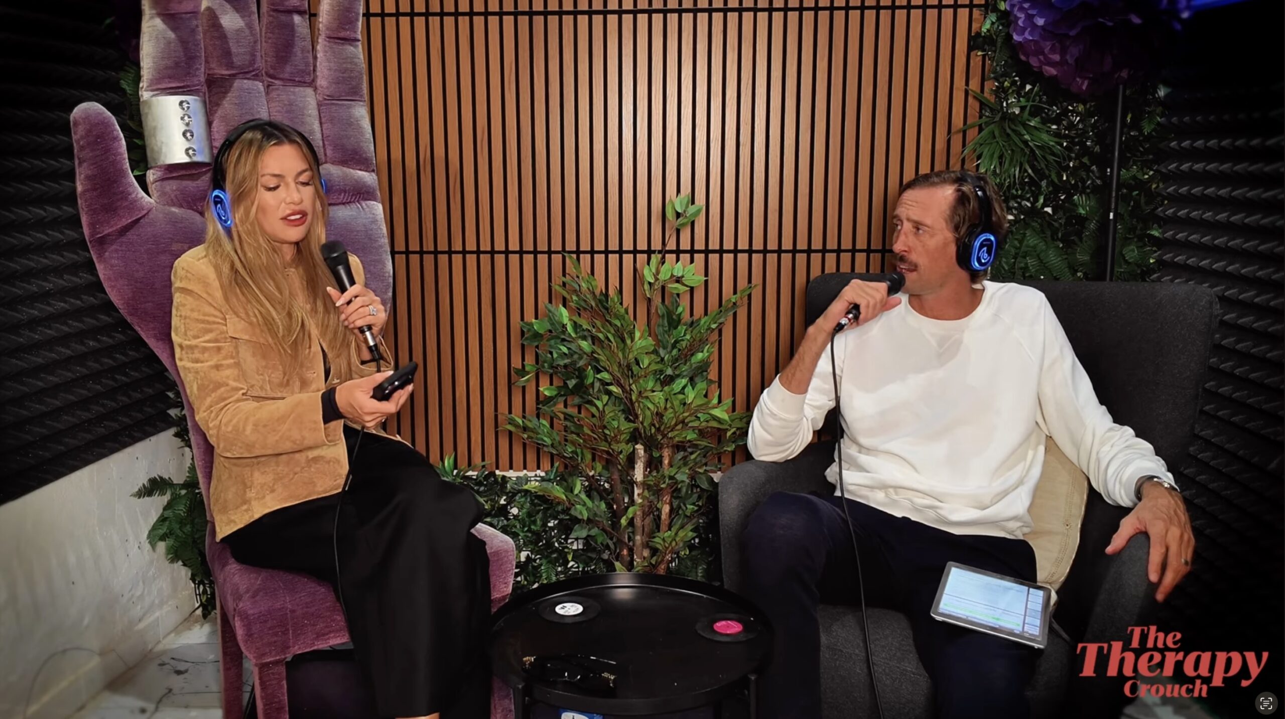 Abbey Clancy and Peter Crouch talking 
