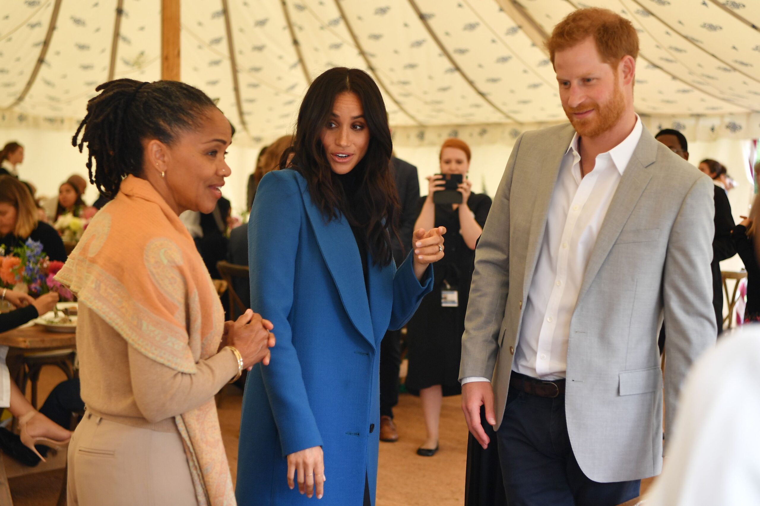 Doria Ragland with Meghan Markle and Prince Harry at event