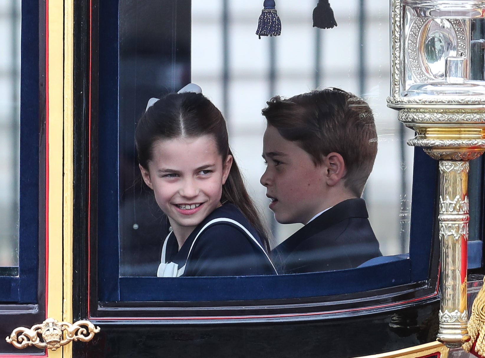 Charlotte and George playing outside