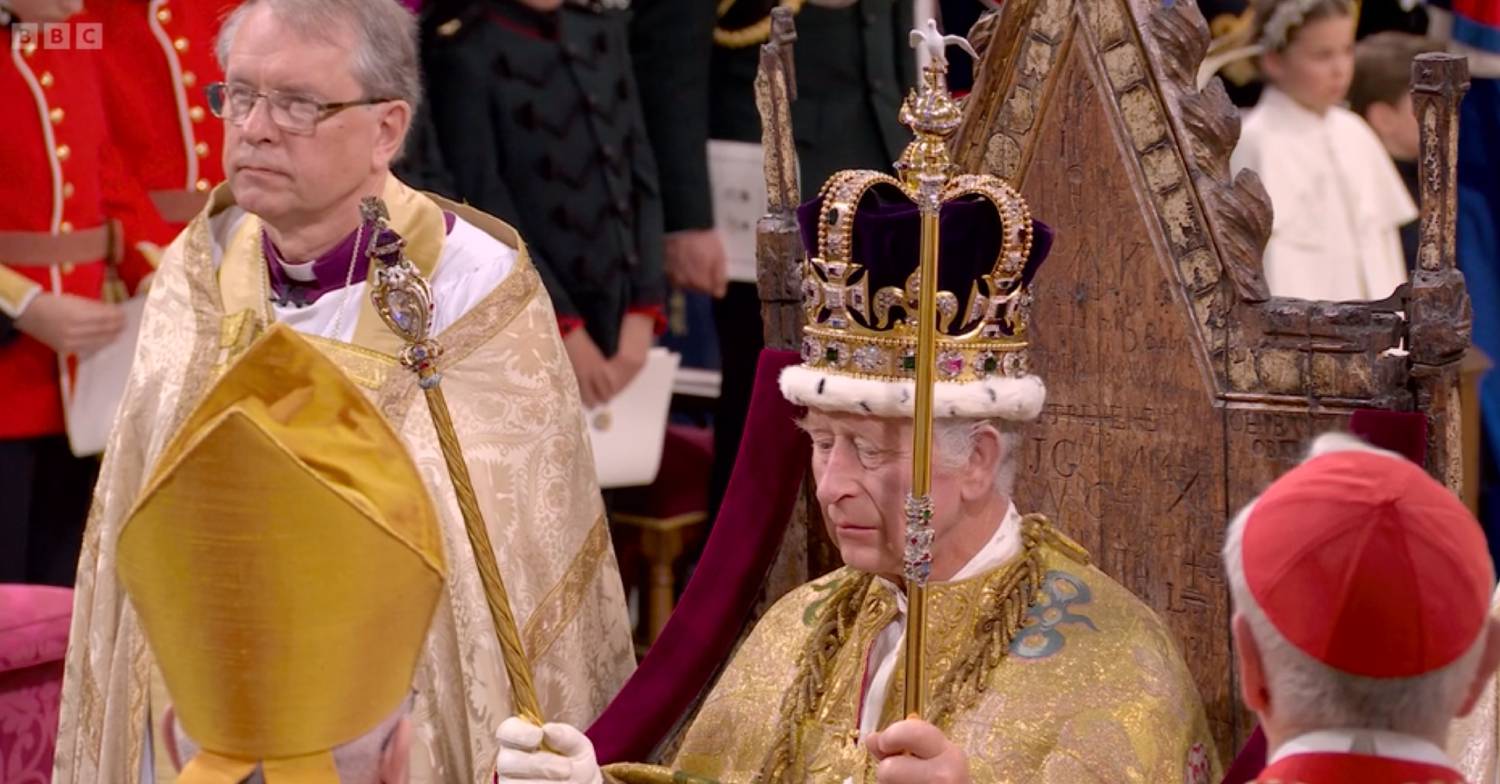 King Charles looks downwards