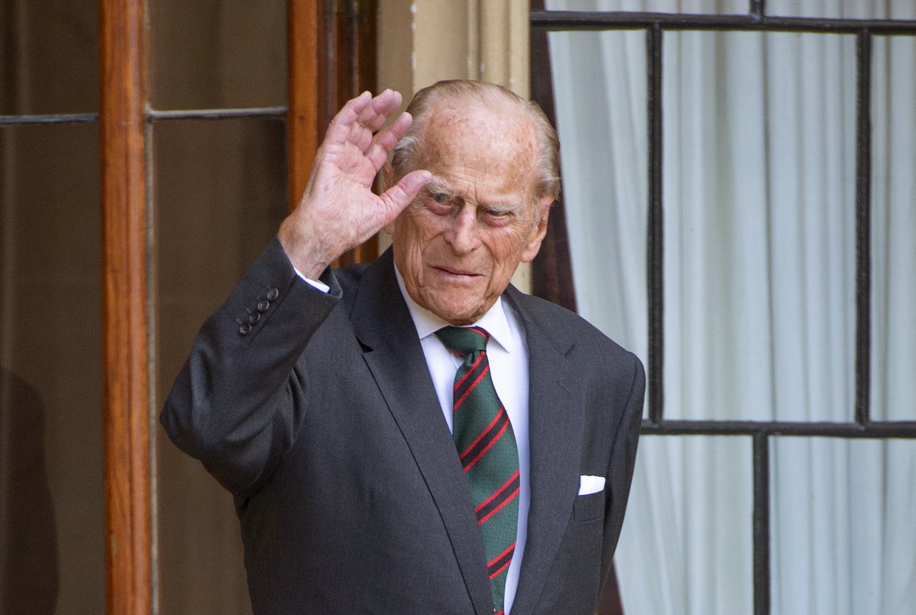 Prince Philip waves to well-wishers