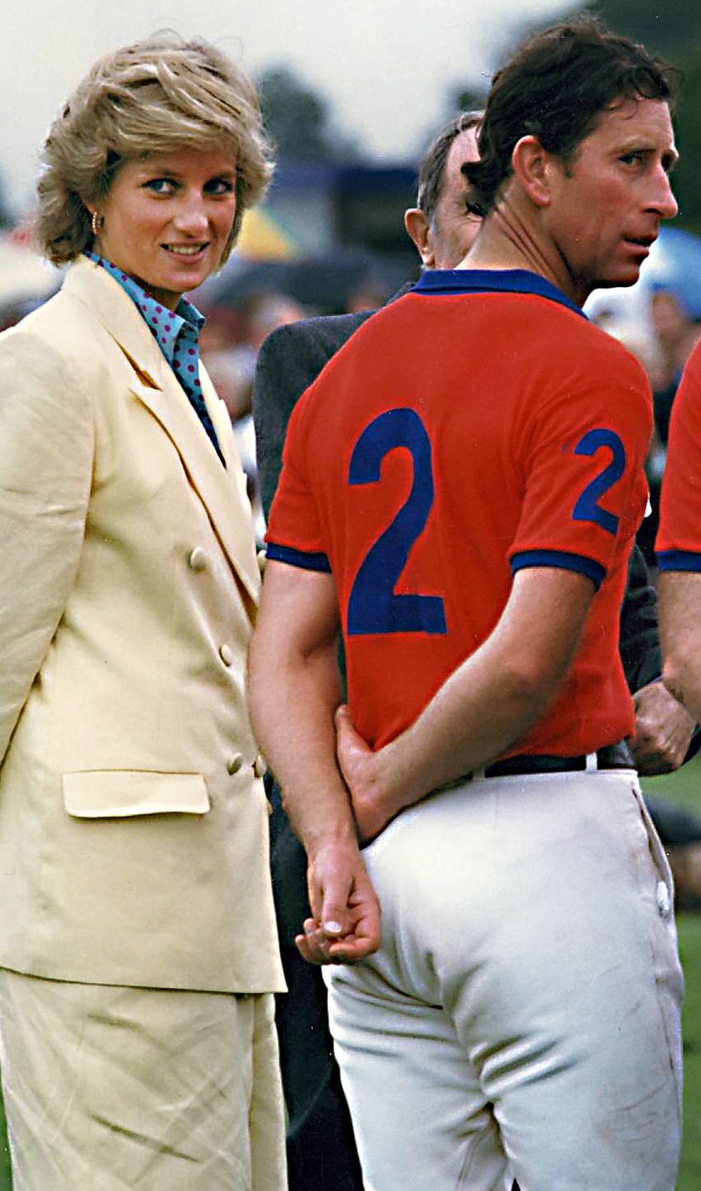 Princess Diana stands with Prince Charles