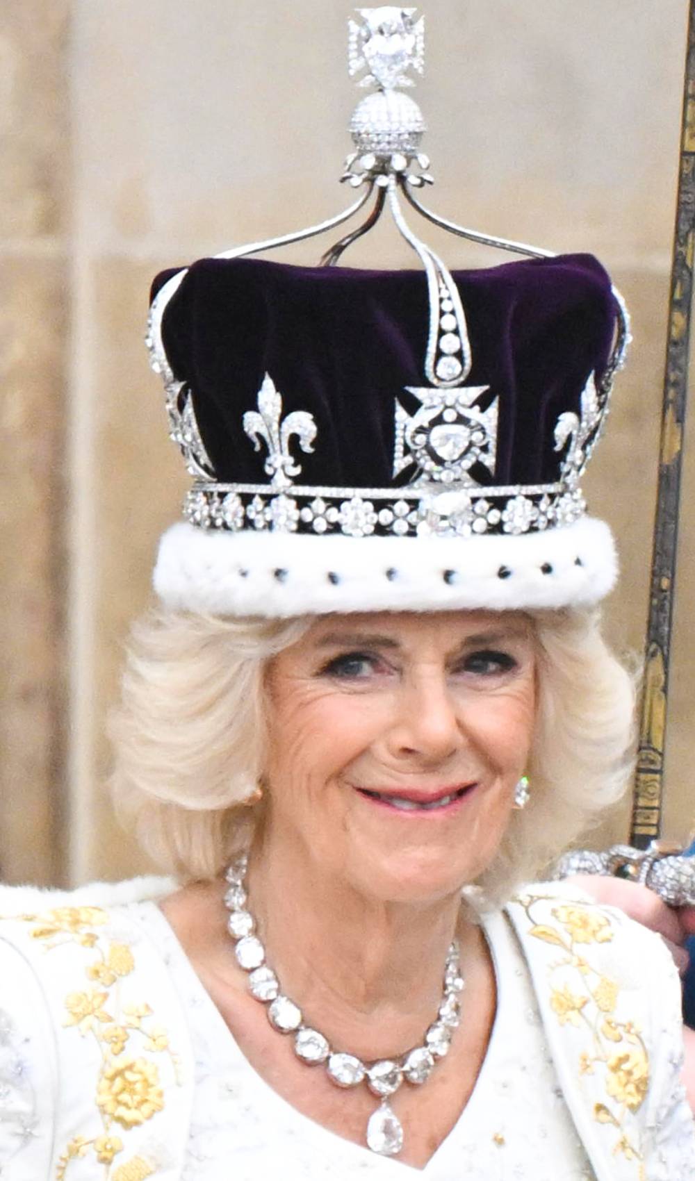 Queen Camilla smiles