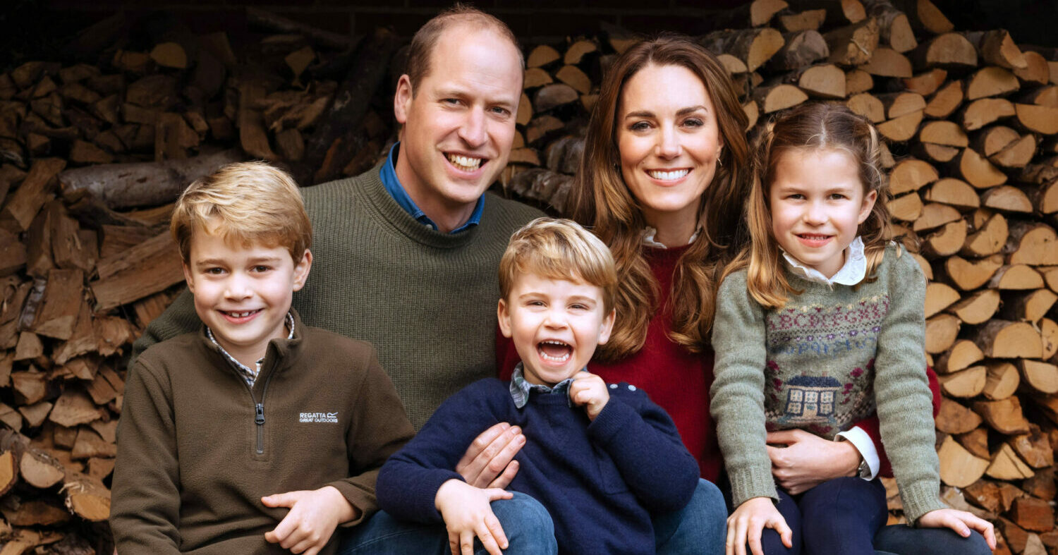 Prince Georges smiling with his parents and siblings Princess Charlotte and Prince Louis