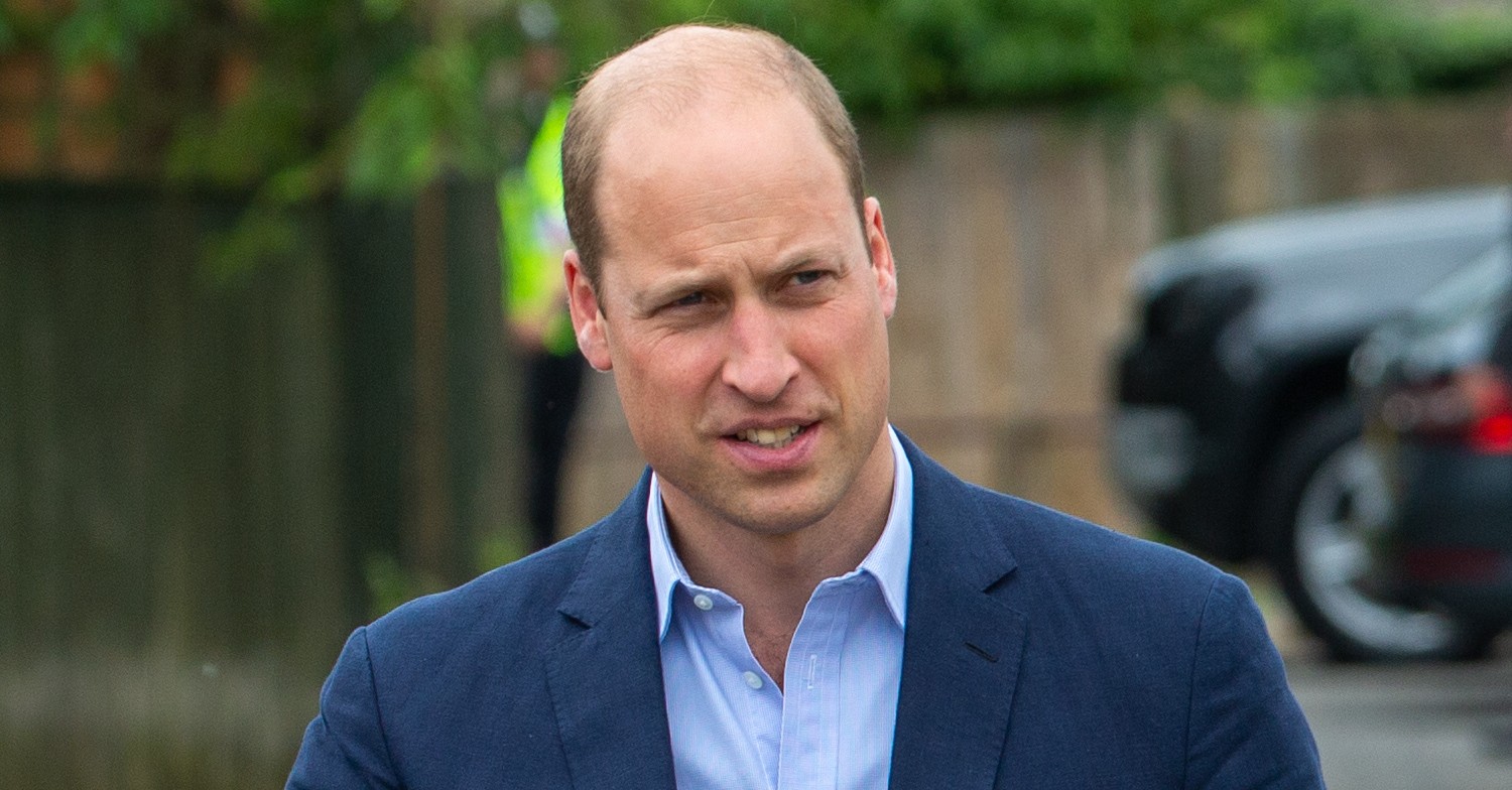 Prince William smiling during royal engagement