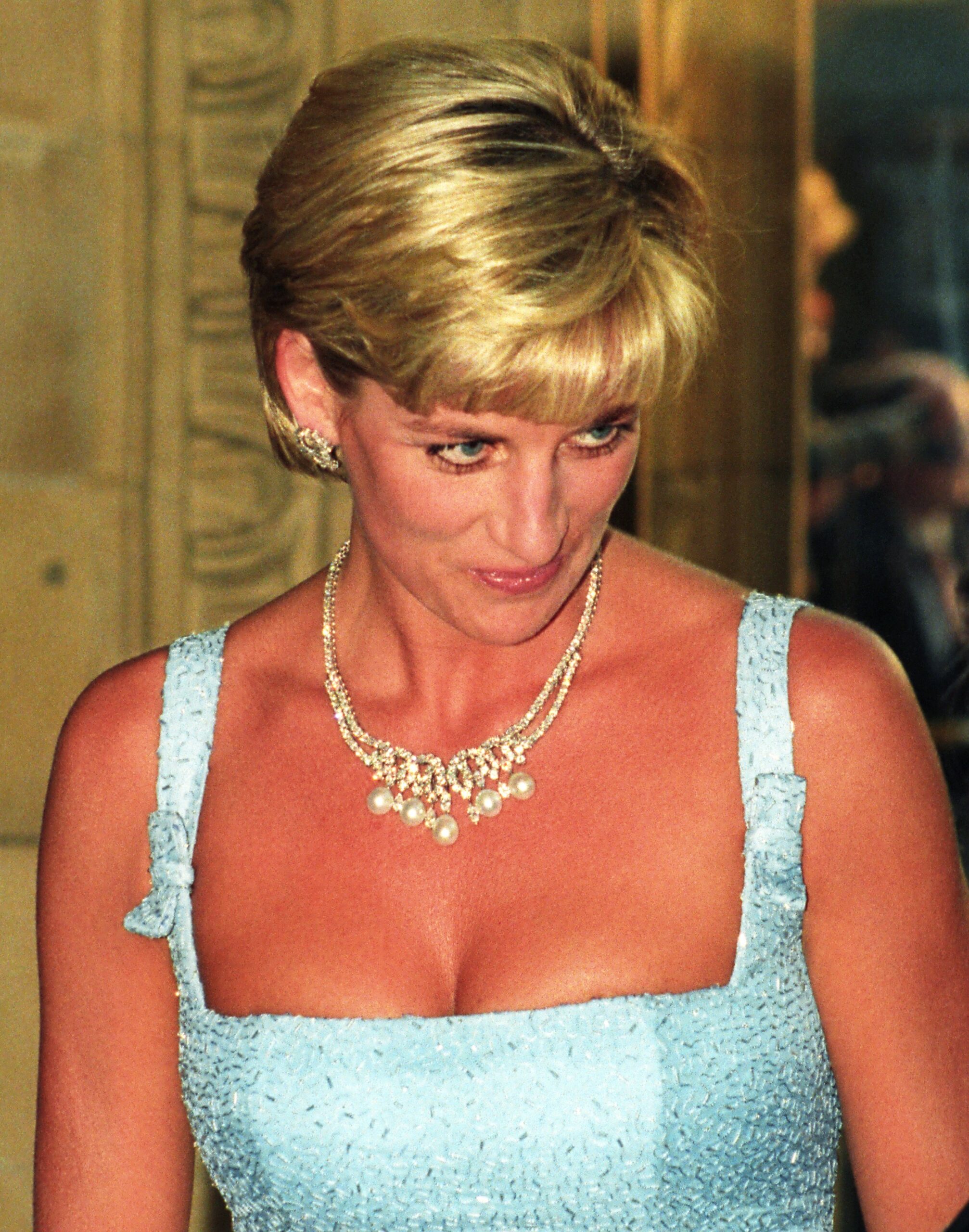 Princess diana stuns in blue dress during royal engagement 